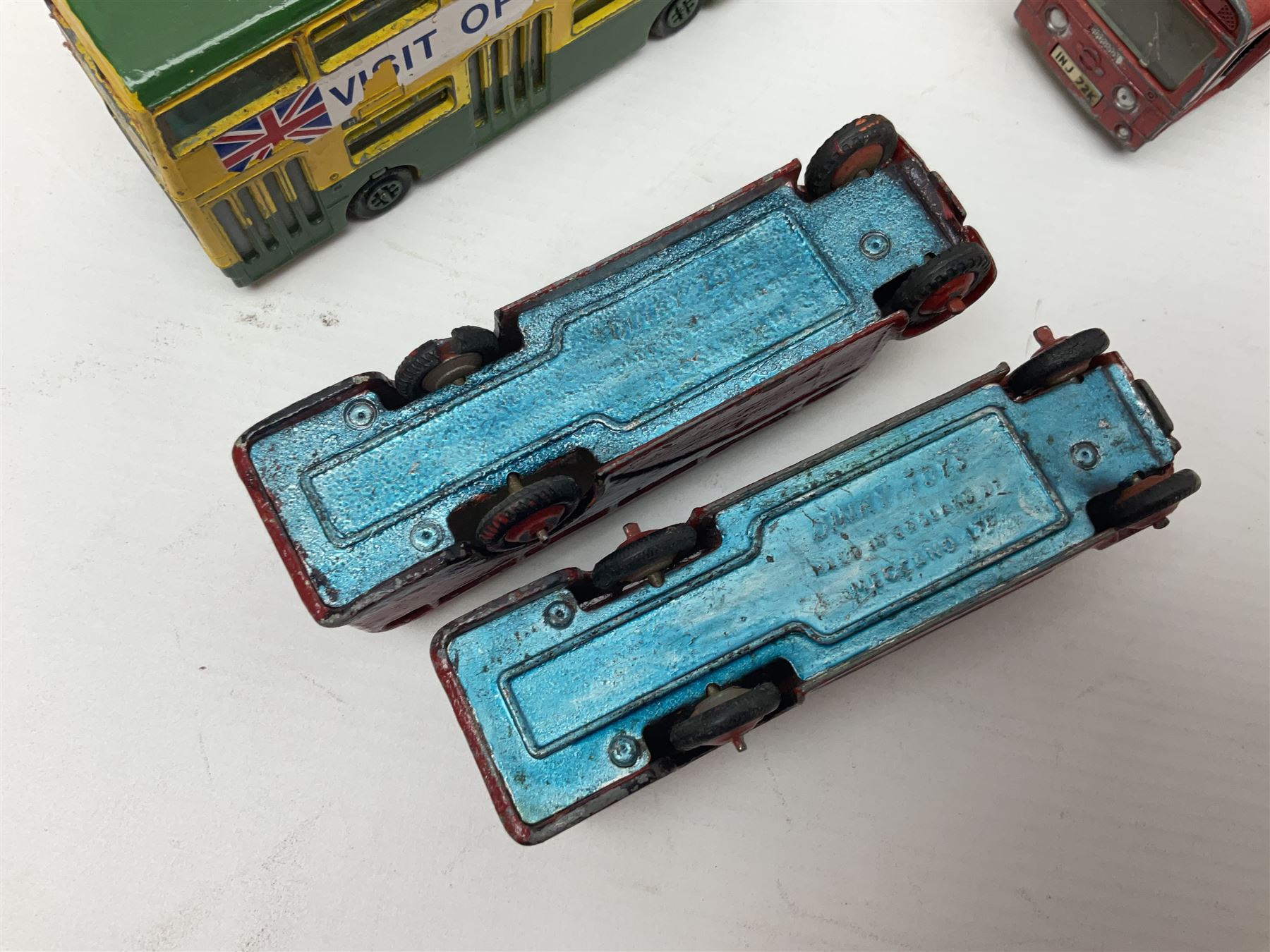 Dinky - sixteen unboxed and playworn die-cast models to include Single Deck Bus, two Atlantean Buses, Ford Transit Van, 10 Ton Army Truck, MGB Sports Car, Telephone Service Van etc 