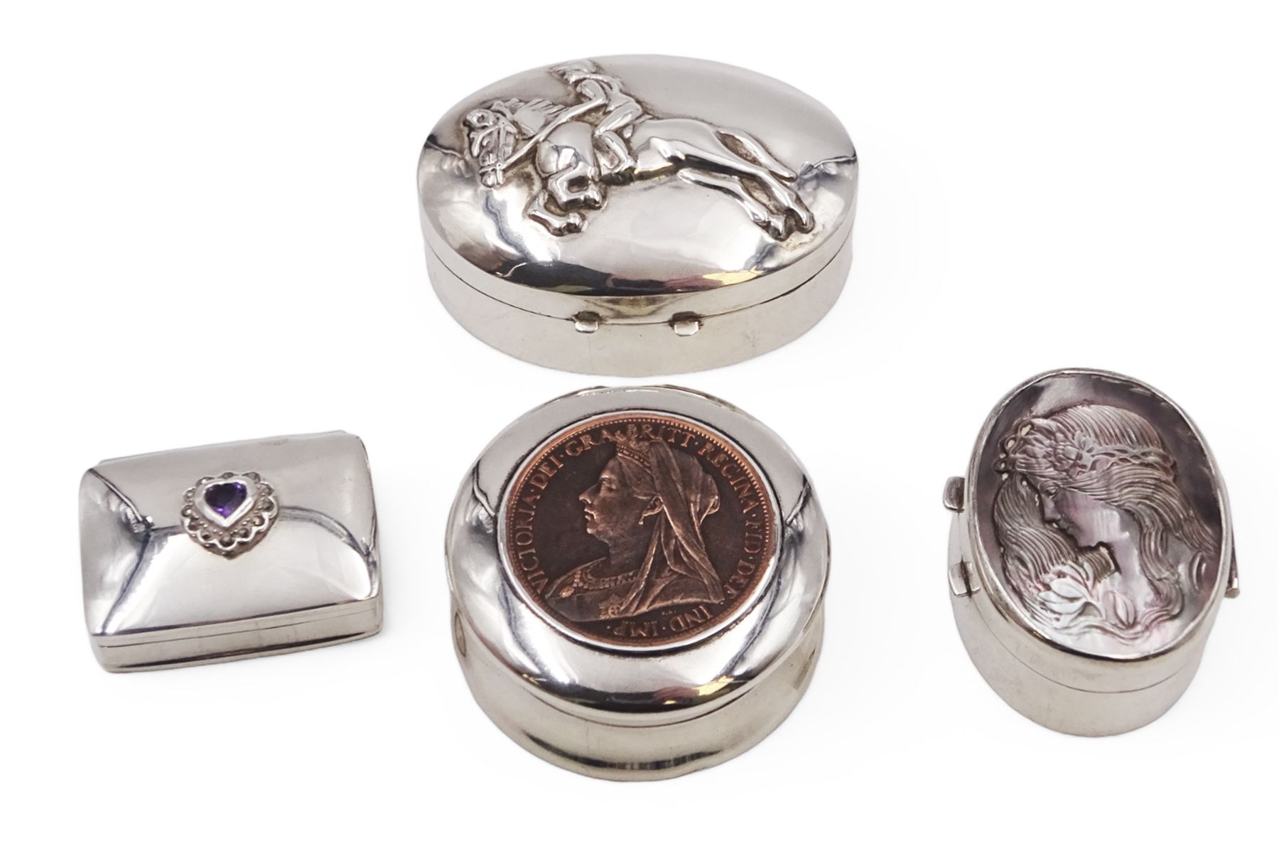 Four silver boxes, comprising oval example embossed with horse and rider, a rectangular example set with heart shaped amethyst, an oval example with set with carved abalone shell portrait, and a circular example set with Victorian penny, all hallmarked 