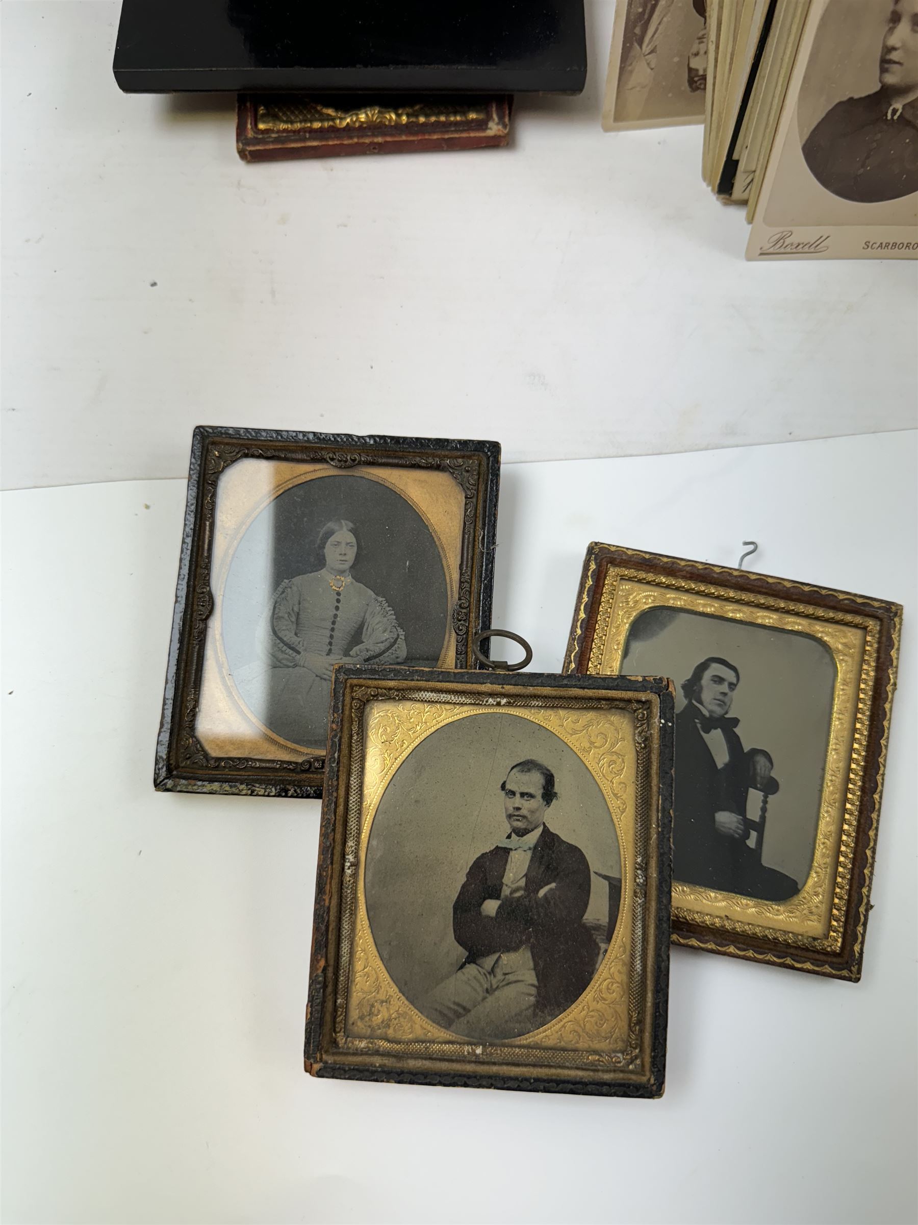 Collection of Victorian daguerreotypes, together with other photographs