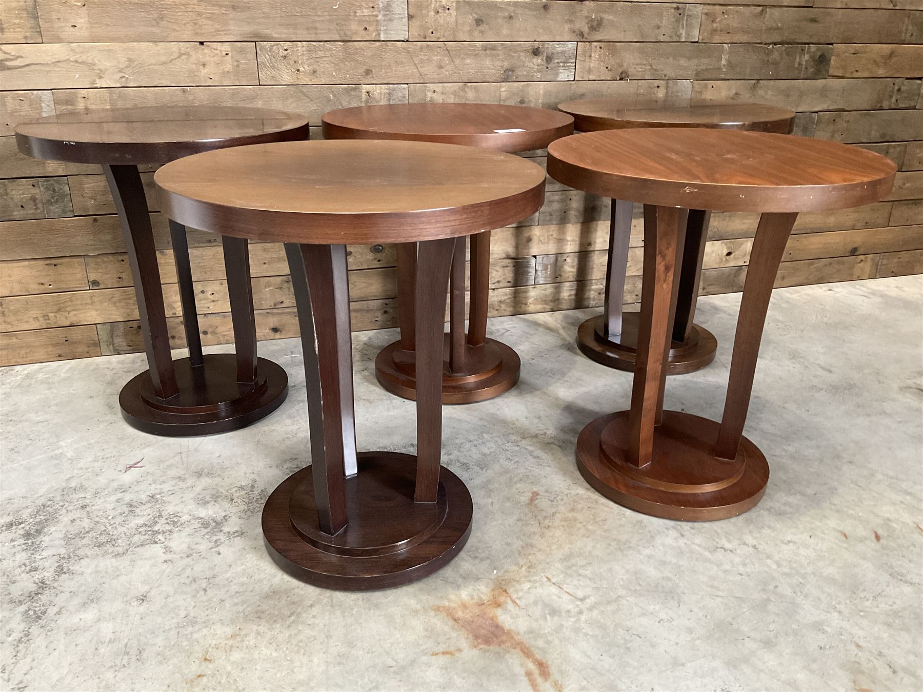 Five walnut circular bar or bedroom occasional tables