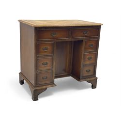 Georgian design mahogany kneehole desk, rectangular tooled leather inset top bordered by c...