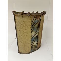 Jim Robison (American 1939-): slab built sculptural stoneware vase, of navette form with textured fabric effect decoration to centre, signed beneath, H35cm