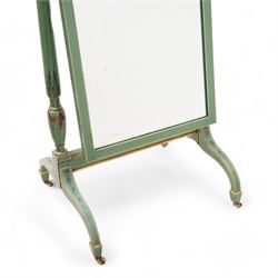 Edwardian Adam Revival green-painted and parcel gilt cheval mirror, shaped pediment painted with urn and flower head festoons, turned supports with carved finials decorated with acanthus leaves and draped festoons, on out splayed supports with spade feet and brass castors 