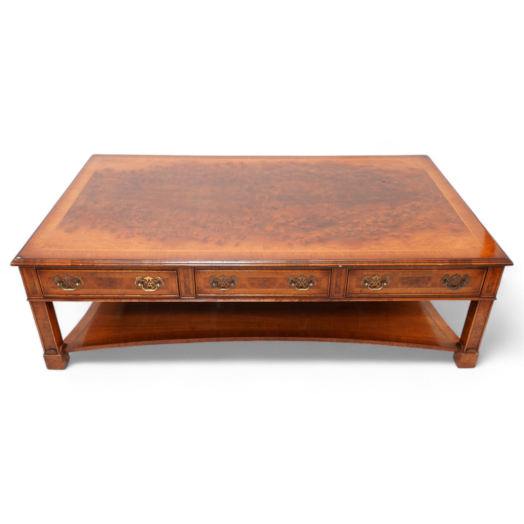 Siesta - Georgian design figured walnut coffee table, rectangular top with moulded edge, fitted with three cock-beaded and crossbanded drawers to each side, on square moulded supports united by a concave under-tier