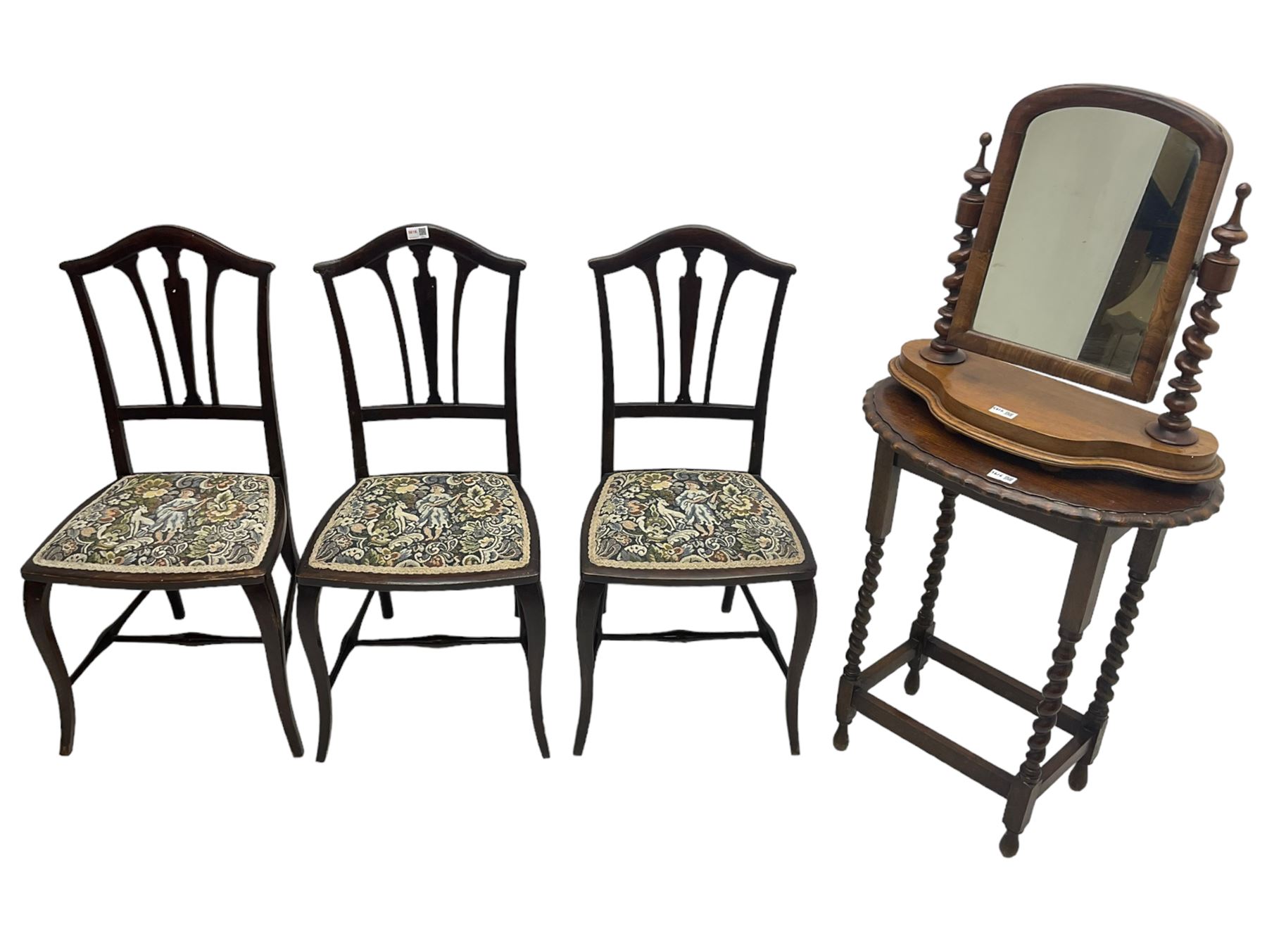 Set three Edwardian stained beech bedroom chairs, seat upholstered in tapestry fabric with pastoral scene and foliage, on cabriole supports; together with oak barley twist side table and a Victorian walnut dressing table mirror (5)