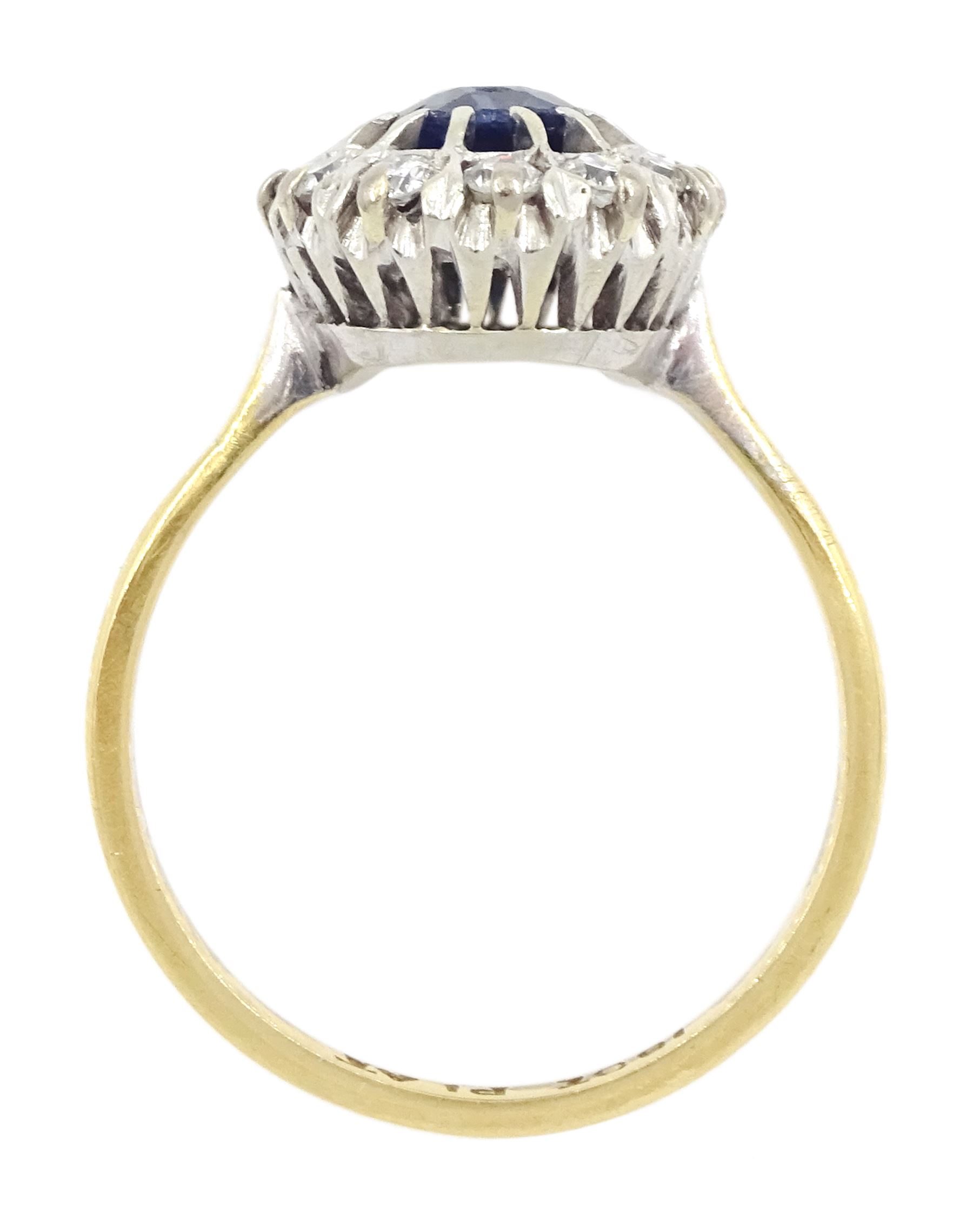 Gold oval cut sapphire and round brilliant cut diamond cluster ring, stamped 18ct Plat, sapphire approx 0.85 carat, total diamond weight approx 0.35 carat