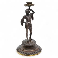 19th century continental bronze candle holder, the column formed as a courtier in Italian dress supporting the sconce, H31cm 