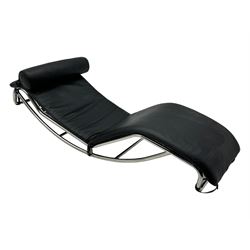 After Le Corbusier, Pierre Jeanneret, and Charlotte Perriand - LC4 chaise longue, black leather upholstery with cylindrical headrest, supported by a chromed tubular steel frame, with cantilever design with elastic webbing