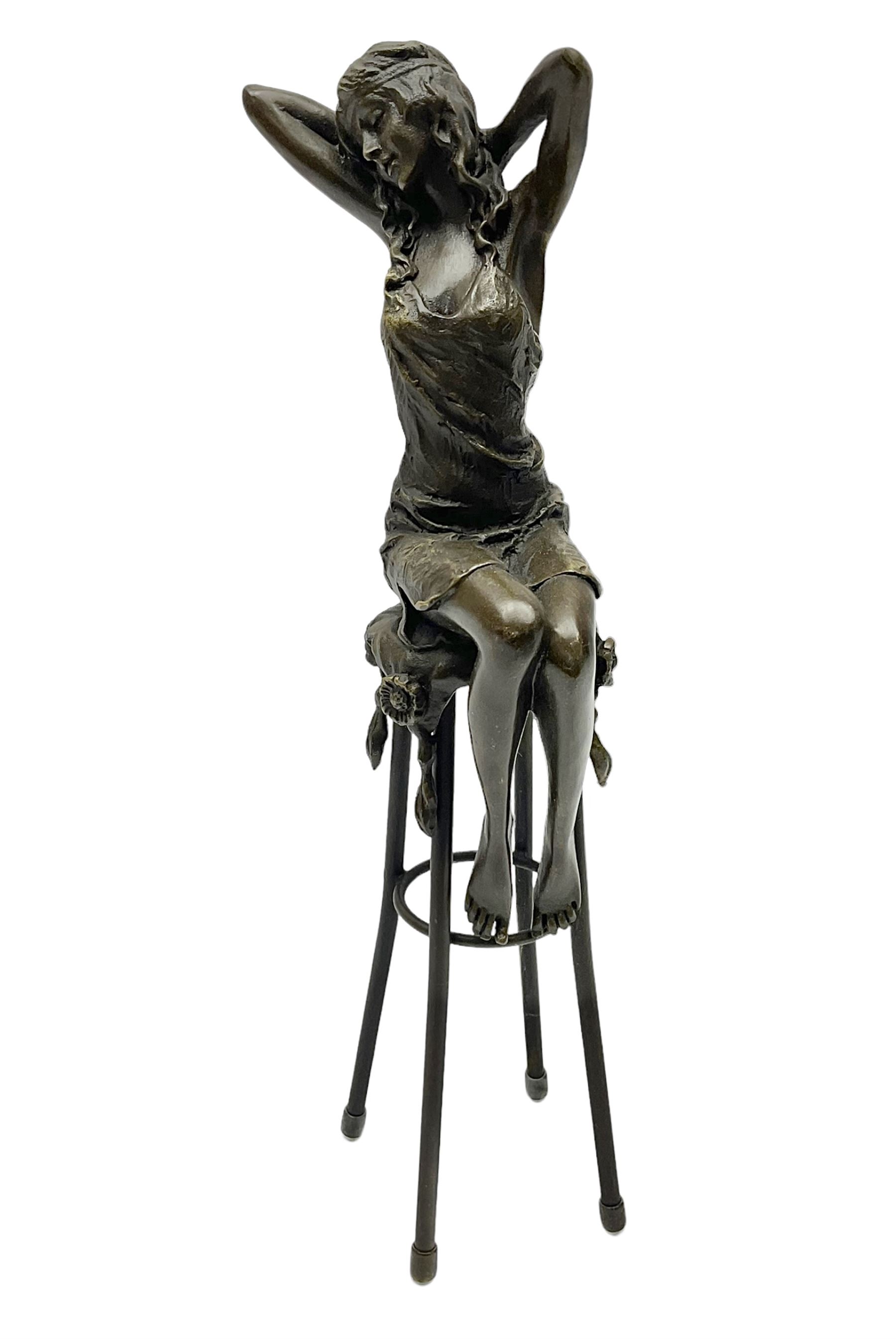 Art Deco style bronze modelled as a female figure seated upon a chair, after 'Pierre Collinet', H28cm