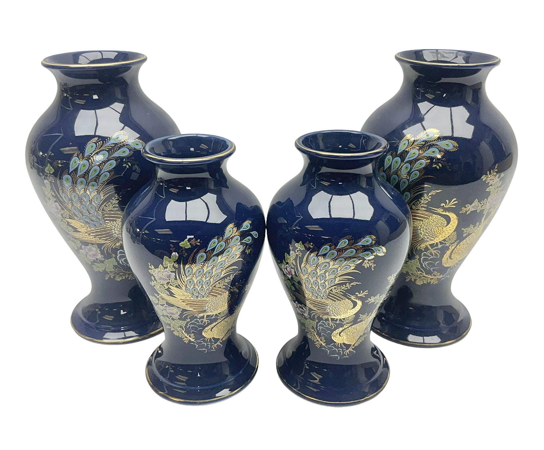 Two pairs of Royal Winton vases, decorated with peacocks on a blue ground, largest H24cm