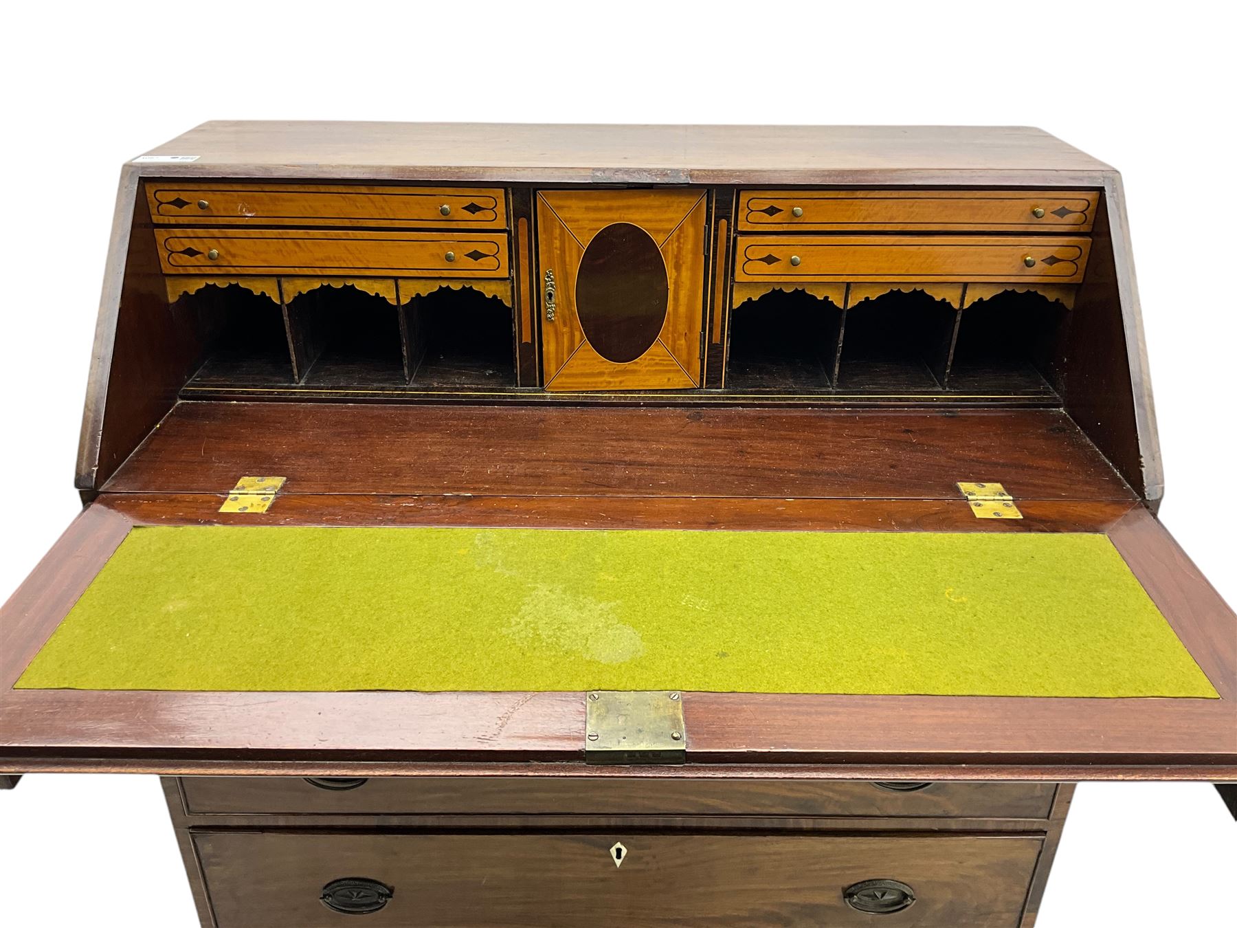 George III mahogany bureau, hinged fall front enclosing satinwood interior fitted with cupboard, drawers and pigeon holes, four long graduating cock-beaded drawers, bone escutcheons, shaped apron on bracket feet 