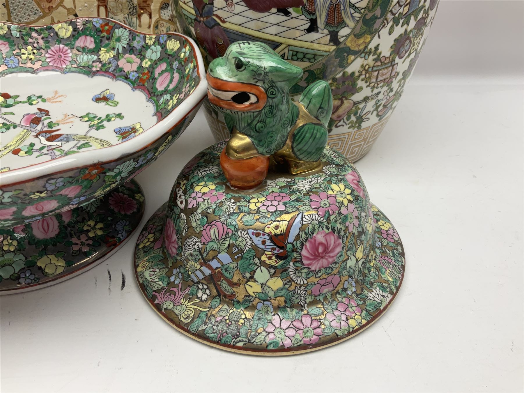 20th century Chinese famille rose jar, the body decorated in polychrome enamels with floral and foliate decoration on a white ground with a central figural panel and gilt key border to base, with six character mark beneath, H31cm, with later turned wooden cover, together with a similar footed bowl and jar,  jar cover with temple dog finial and a large Japanese Satsuma charger