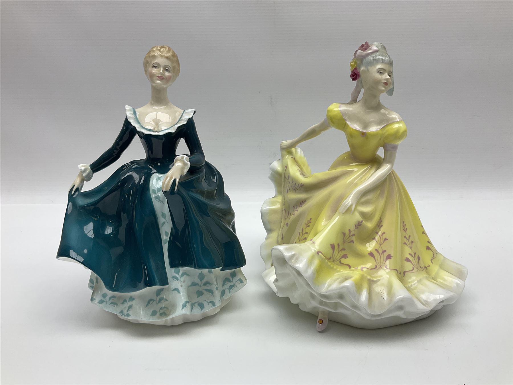 Five Royal Doulton figures, comprising Ninette HN2379, Adrienne HN2304, Top o the Hill HN1934, Janine HN2461, Southern Belle HN2229