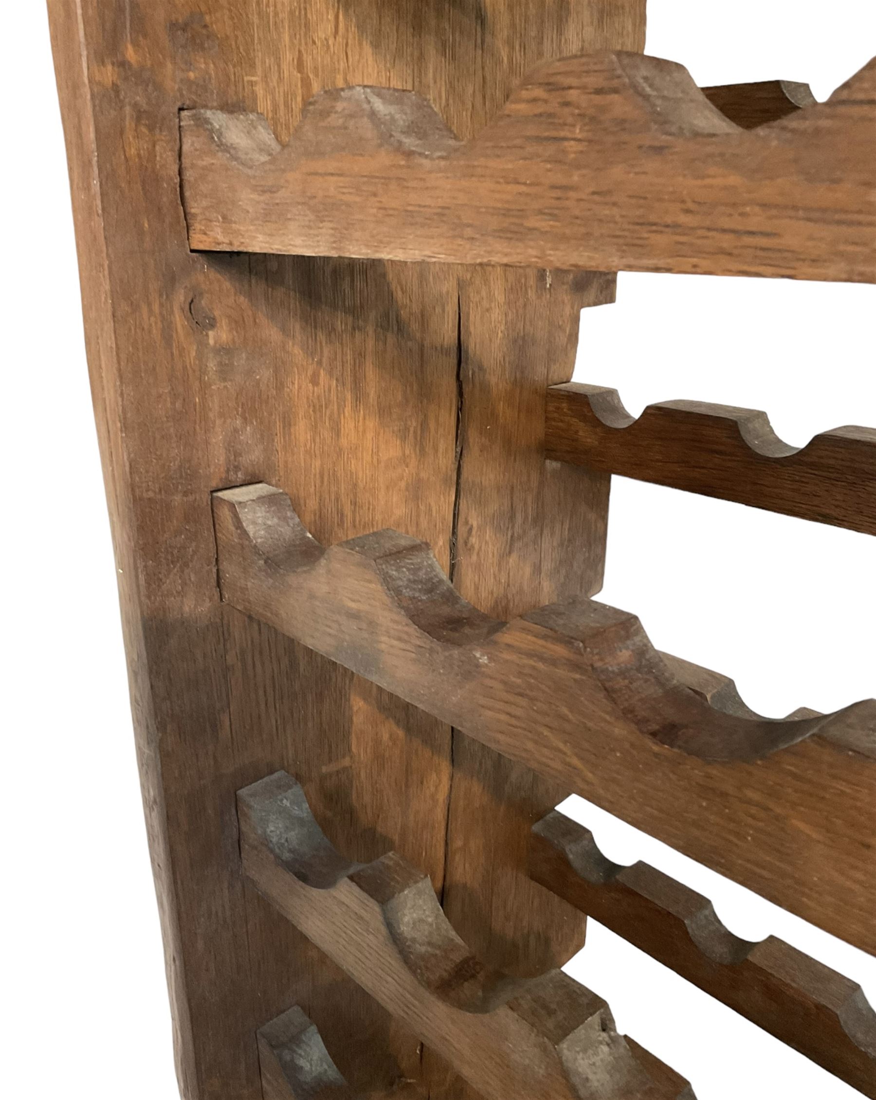 Large reclaimed oak eight tier wine rack, rectangular top over eight racks each with ten bottle divisions, on end supports