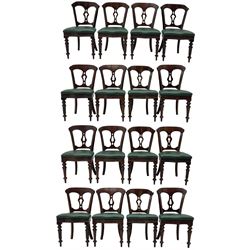 Matched set of twelve Victorian mahogany dining or boardroom chairs, the shaped cresting rail decorated with scrolled decoration, upholstered drop-on seats upholstered in green fabric, on turned supports  