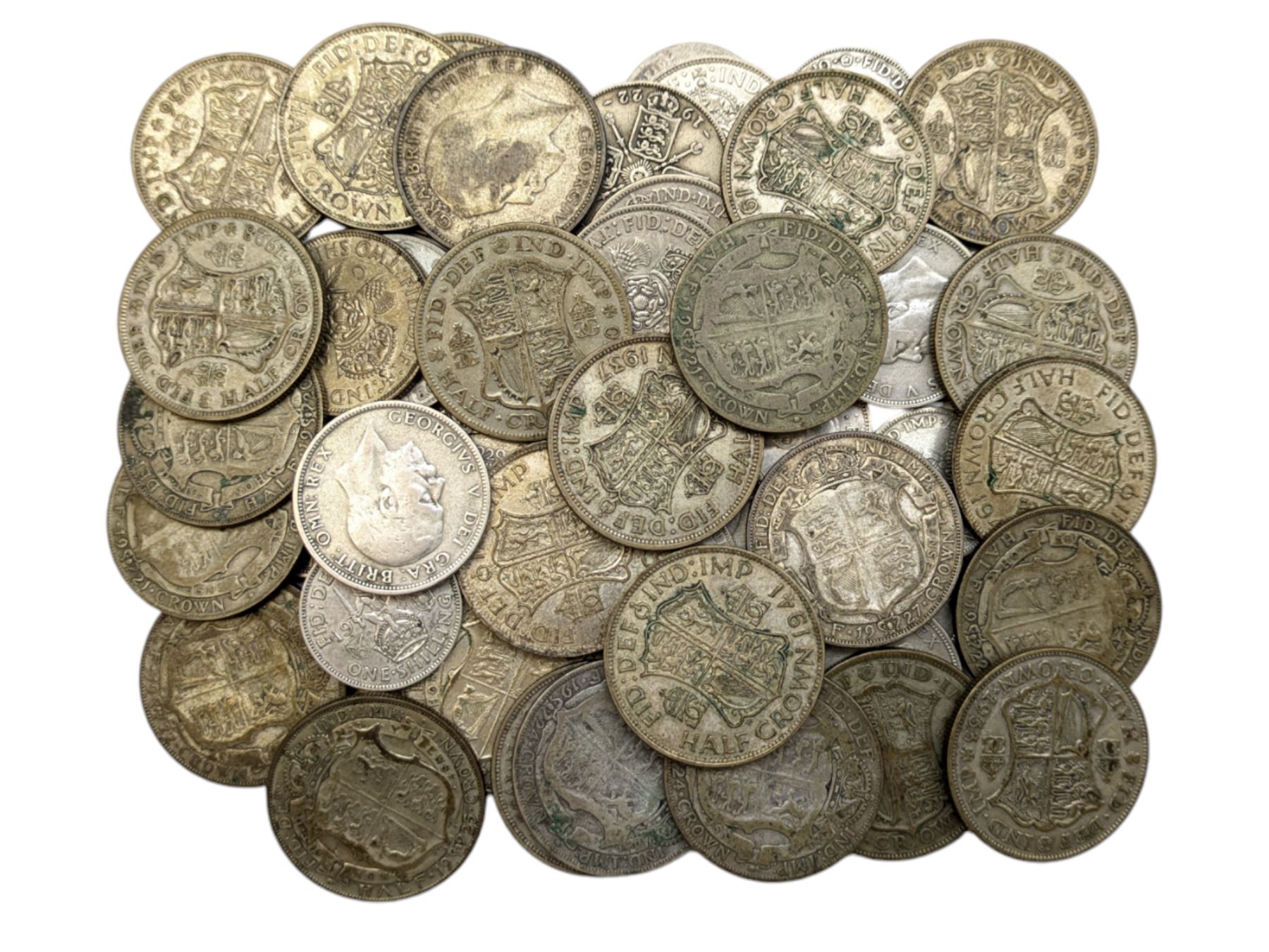 Approximately 590 grams of Great British pre 1947 silver coins, including one shillings, florins or two shillings and halfcrowns