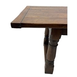 20th century Jacobean design oak refectory dining table, rectangular plank top with cleated ends, on turned supports united by H-stretchers 