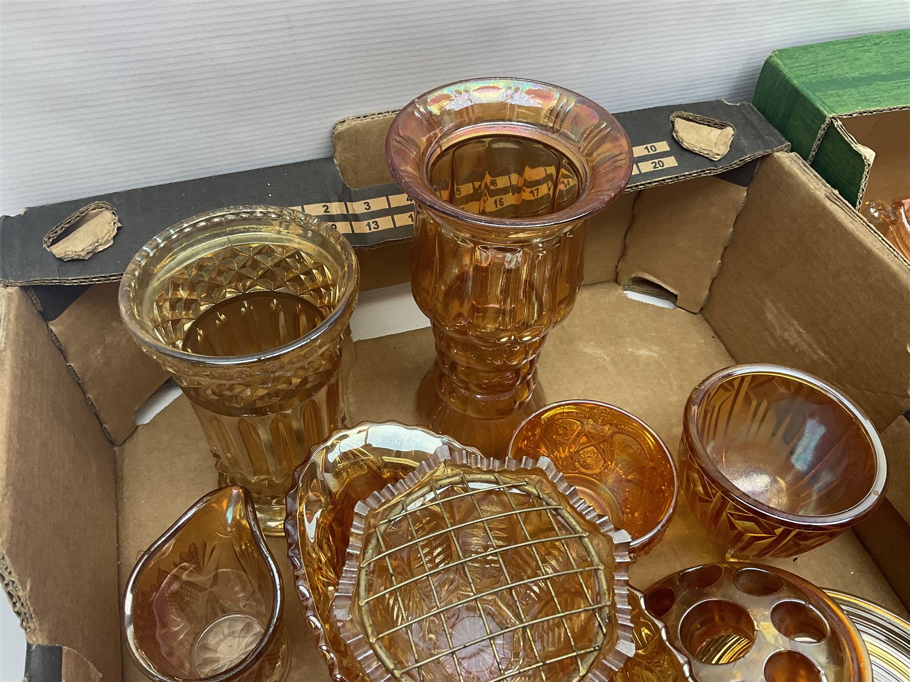 Collection of orange carnival glass, including jugs, dishes, vases etc, in two boxes 