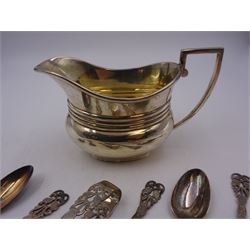 Early 20th century silver jug, of oval slightly bellied form, with angular handle and banded decoration to body, hallmarked Fordham & Faulkner, Sheffield 1911, together with set of five 1920s silver tennis themed coffee spoons and sugar tongs, hallmarked  Josiah Williams & Co (David Landsborough Fullerton), London 1922, jug H9cm