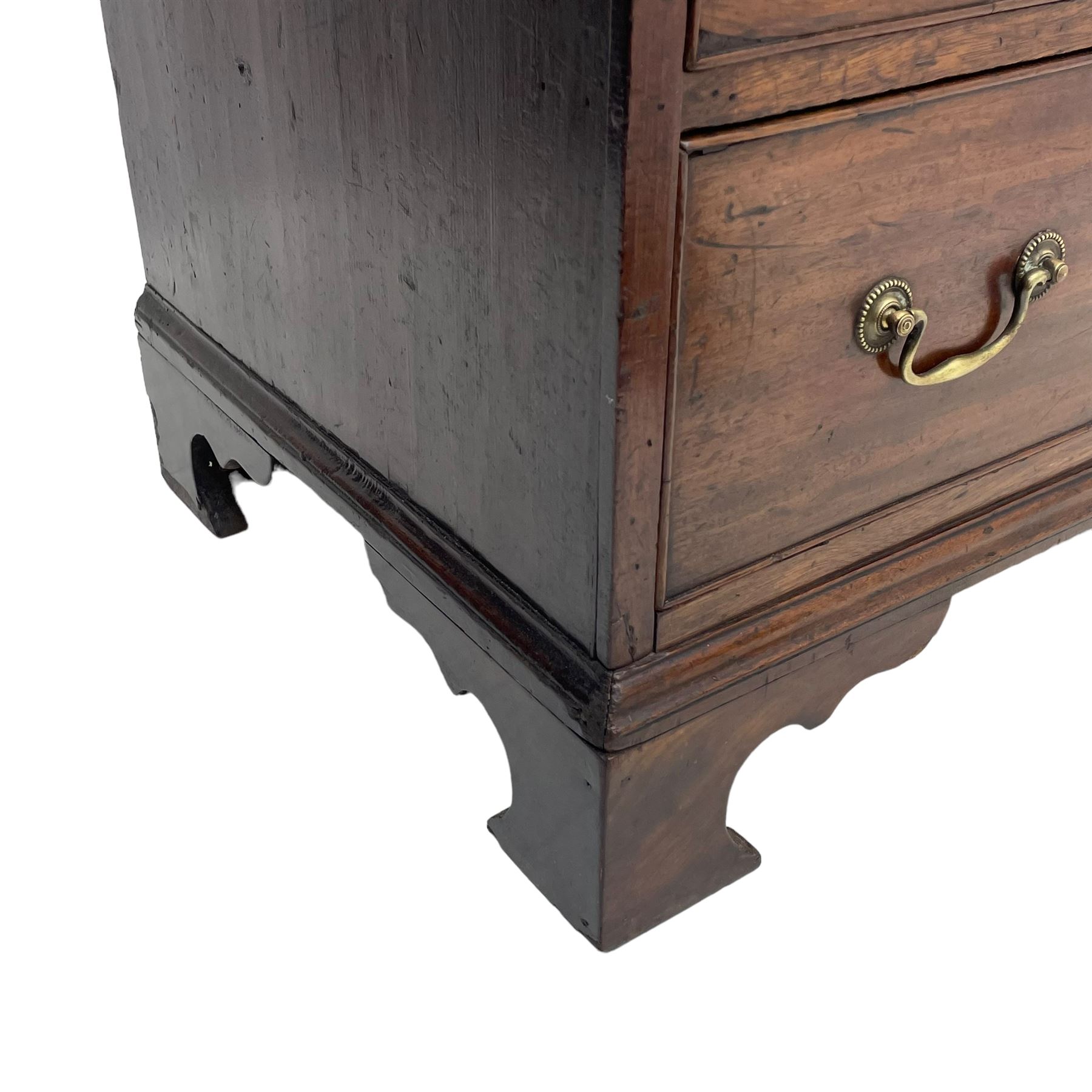 George III mahogany chest, moulded rectangular top over four long graduating cock-beaded drawers, fitted with brass swan neck handles, on bracket feet