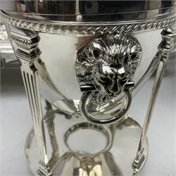 Edwardian silver plated swing handled basket, with pierced sides, engraved May 18 1904, with engraved initial A to handle, upon four ball and claw feet, together with other silver plated item including a similar swing handled basket, with embossed floral border, upon a rectangular pedestal, an egg coddler, with lion mask handles, hot water pot and a moulded glass biscuit barrel, coddler H22cm