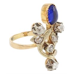 Russian early 20th century 14ct rose and white gold, oval cabochon cut synthetic sapphire and old cut diamond flower design ring, stamped 585 with Soviet star, total diamond weight approx 0.60 carat