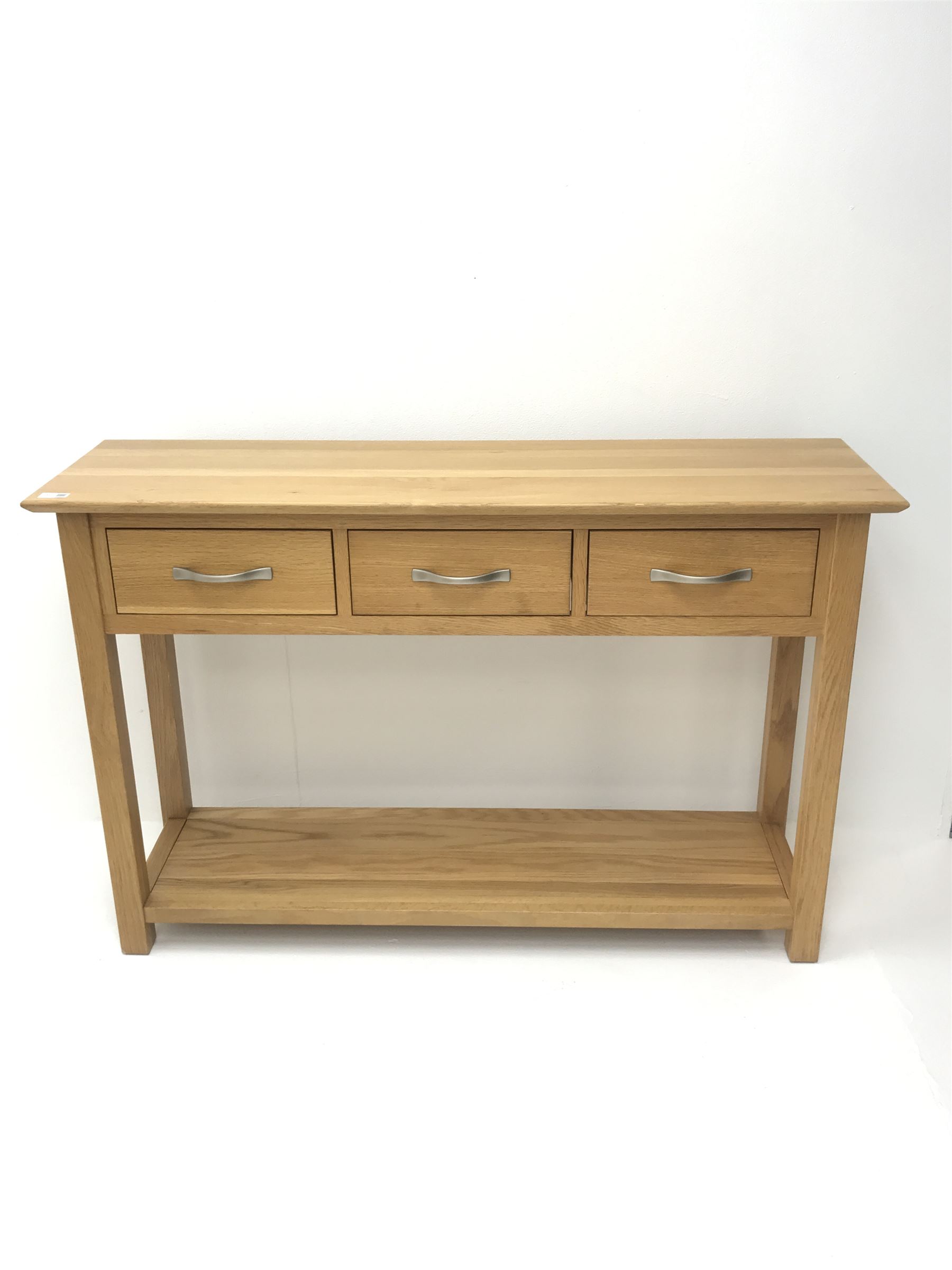 Light oak side console table, three drawers, square supports joined by solid undertier