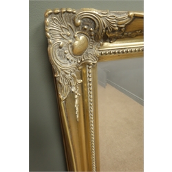  Rectangular bevel edge wall mirror in swept gilt frame, W105cm, H131cm  
