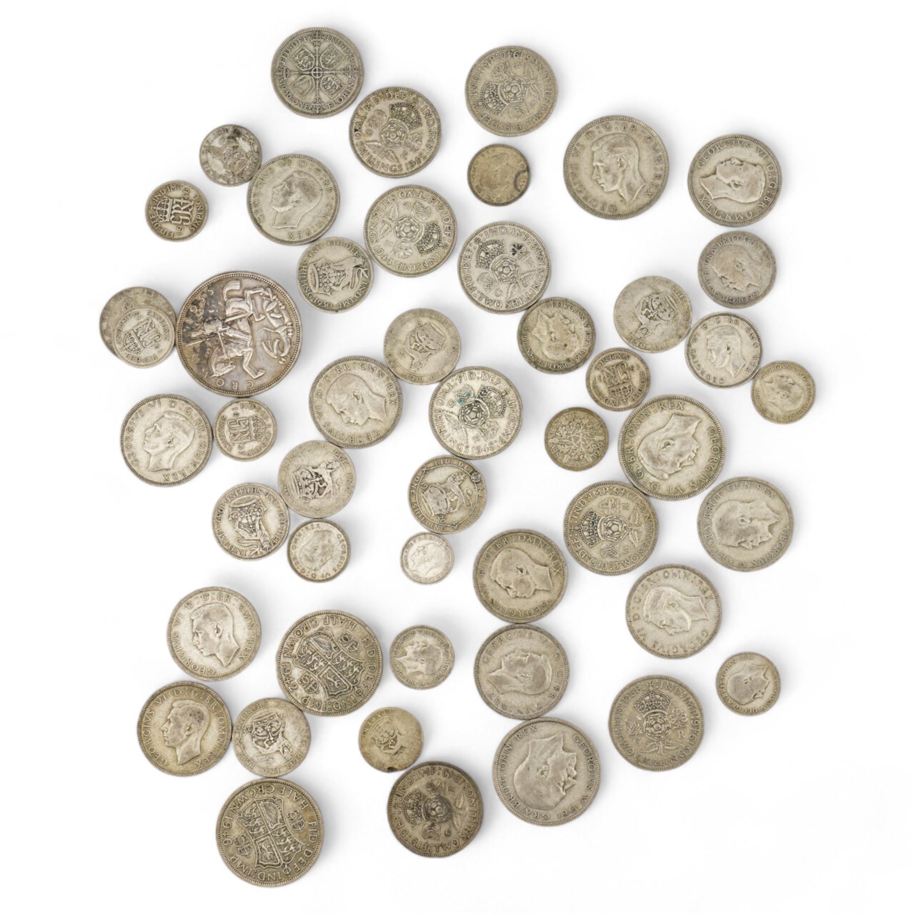 Approximately 400 grams of Great British pre 1947 silver coins, including shillings, halfcrowns, King George V 1935 crown etc