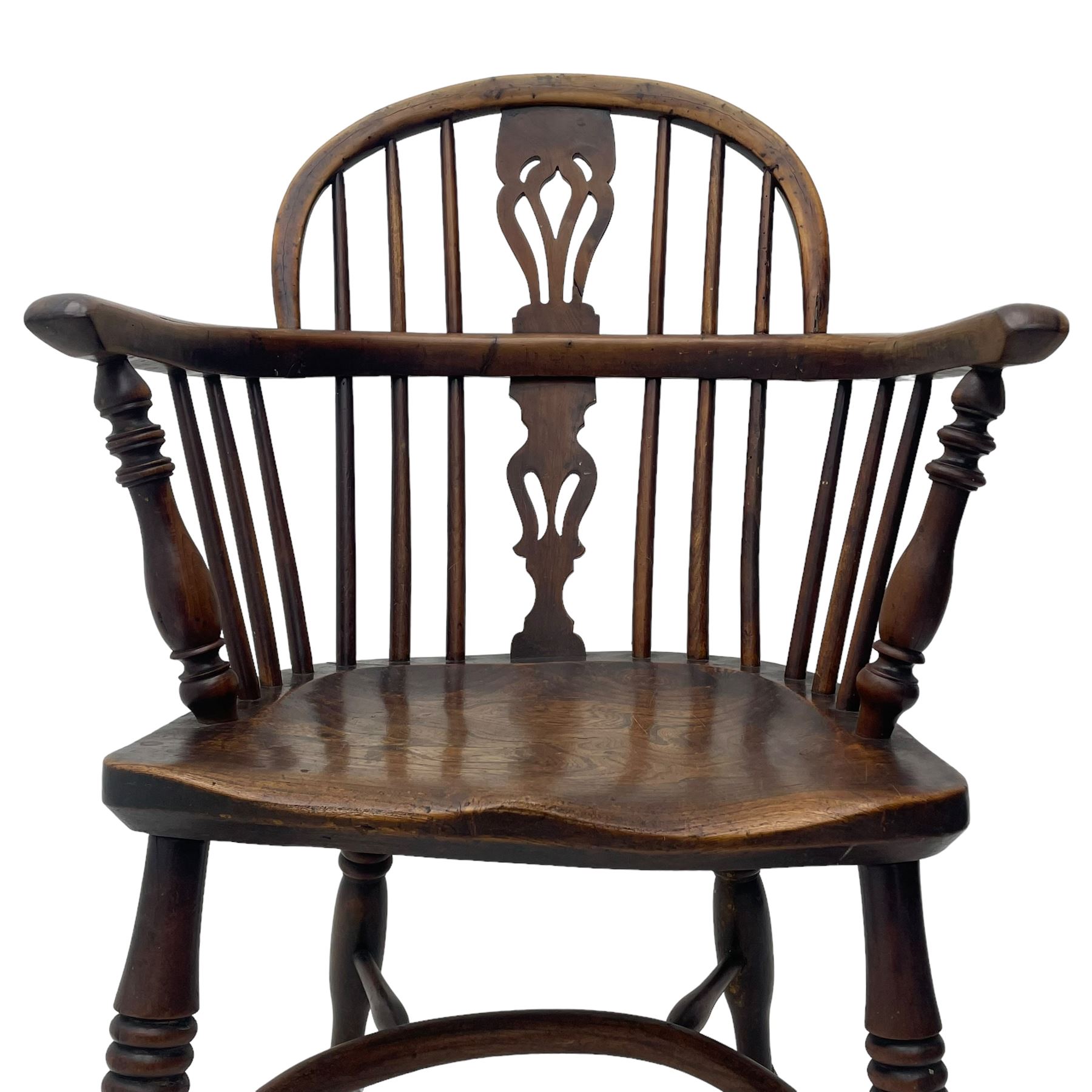 19th century yew wood and elm Windsor armchair, low double hoop stick and pierced splat back, dished seat on turned supports united by crinoline stretchers