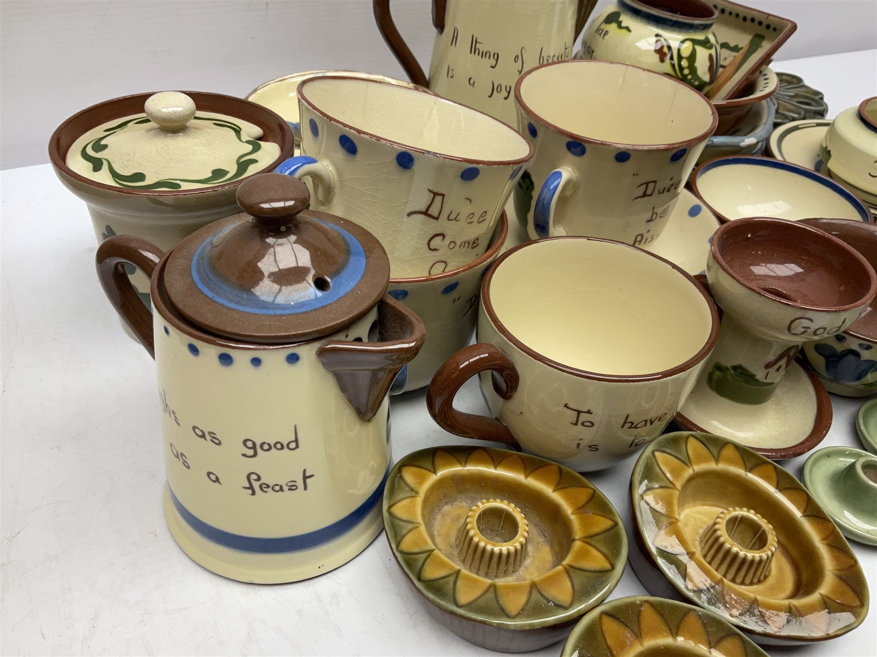 Collection of Motto ware, including cups and saucers, coffee pot, milk jug etc together with studio pottery dishes 