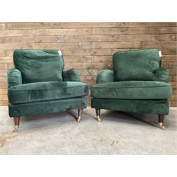 Pair of Howard design armchairs, upholstered in jade green velvet fabric