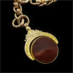 Early 20th century 9ct rose gold graduating rollerball, double link bracelet by W H Wilmot Ltd, Birmingham 1922, each link stamped 9.375, with 9ct gold bloodstone and carnelian swivel fob, Chester 1921