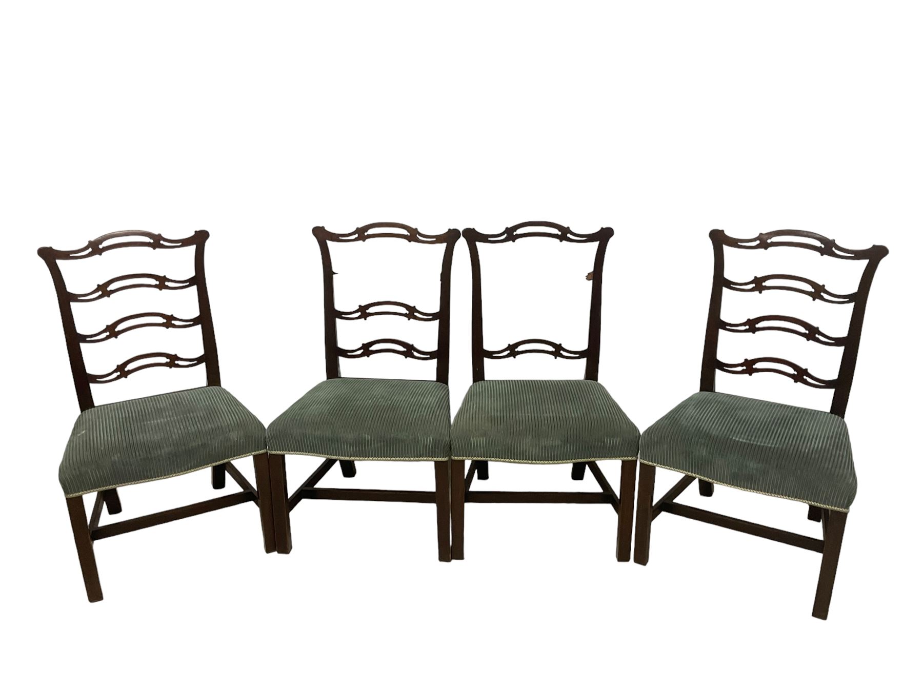 Set of twelve (10+2) Chippendale revival stained beech dining chairs, pierced waived ladder backs with over-stuffed over seats, on square moulded supports joined by stretchers