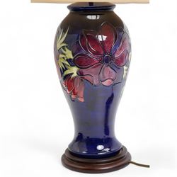 Moorcroft baluster form table lamp decorated in the Anemone pattern, on blue ground, with shade, H36cm excluding fitting