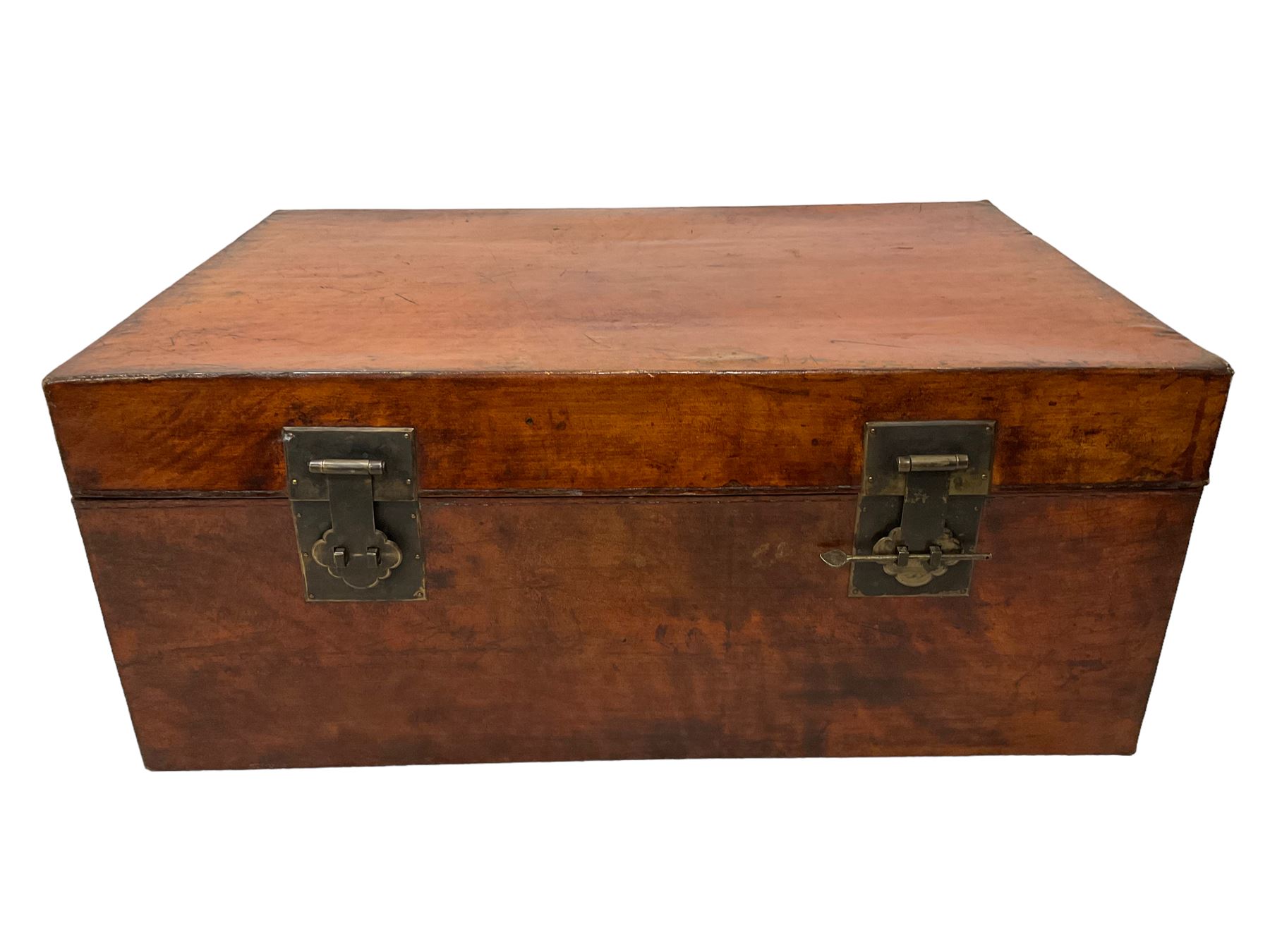 Chinese leather bound and wooden trunk, fitted with metal locks and twin carrying handles, on ebonised stand 