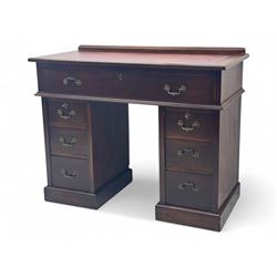 George III mahogany kneehole desk, rectangular top with a gilt-tooled red leather writing ...