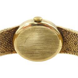 Omega ladies 9ct gold manual wind wristwatch, oval champagne dial with baton hour markers, Cal. 625, on integral 9ct gold bracelet, London 1977/78, boxed with papers