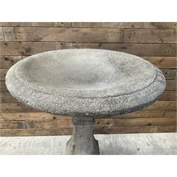 Cast stone garden bird bath, circular dished top, raised on square tapering column, on stepped base with separate mounting plinth