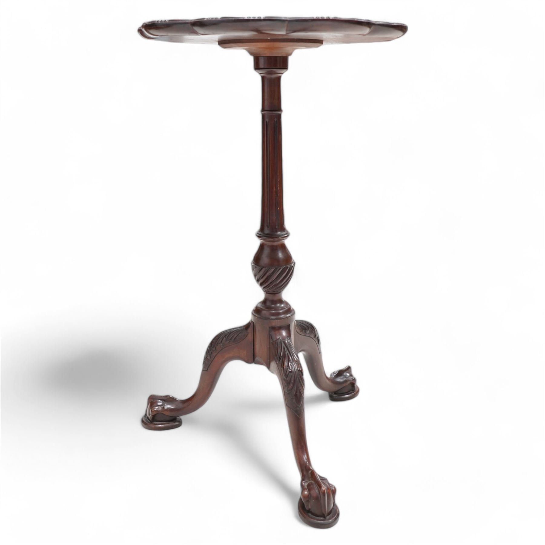 Georgian design mahogany wine table, circular dished top with moulded scalloped edge, raised on a fluted pedestal with spiral reeded decoration, tripod base with splayed supports carved with acanthus leaves, terminating to ball and claw feet 