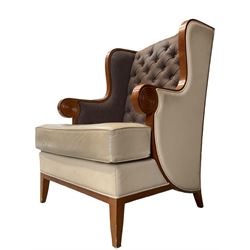 Walnut finish framed wing back armchair upholstered leather and buttoned fabric