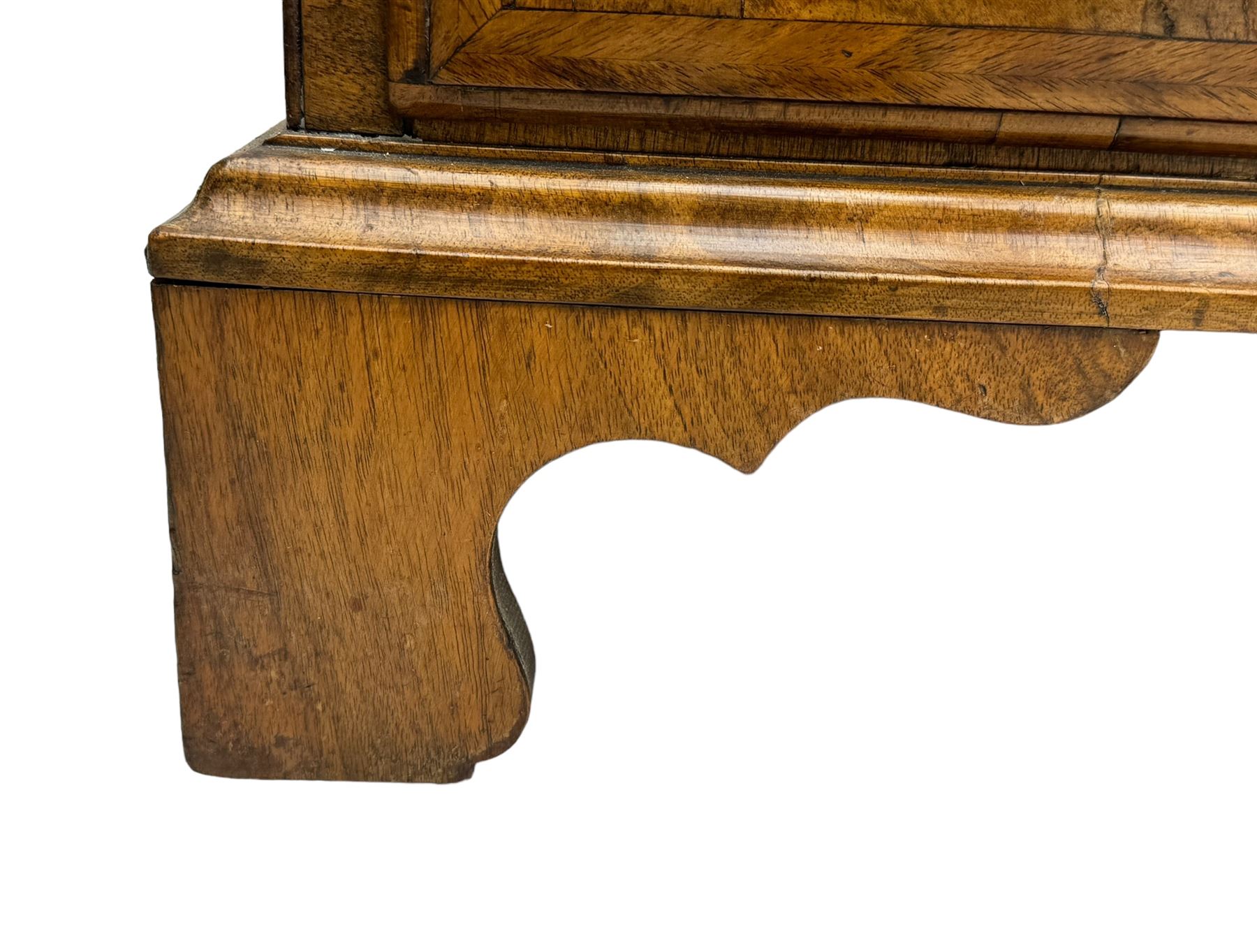 18th century walnut bureau, fall-front enclosing fitted interior with drawers and pigeonholes, over two short and two long drawers with brass escutcheon plates and handles, raised on bracket feet