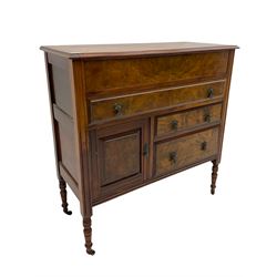 Edwardian walnut gentleman's tallboy, moulded hinged lid enclosing divisions, long drawer over two short drawers and panelled cupboard, turned supports terminating at ceramic castors