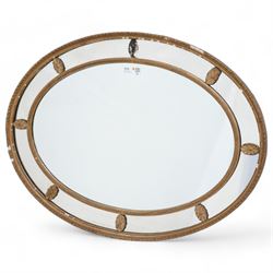 Victorian oval giltwood and gesso wall mirror 