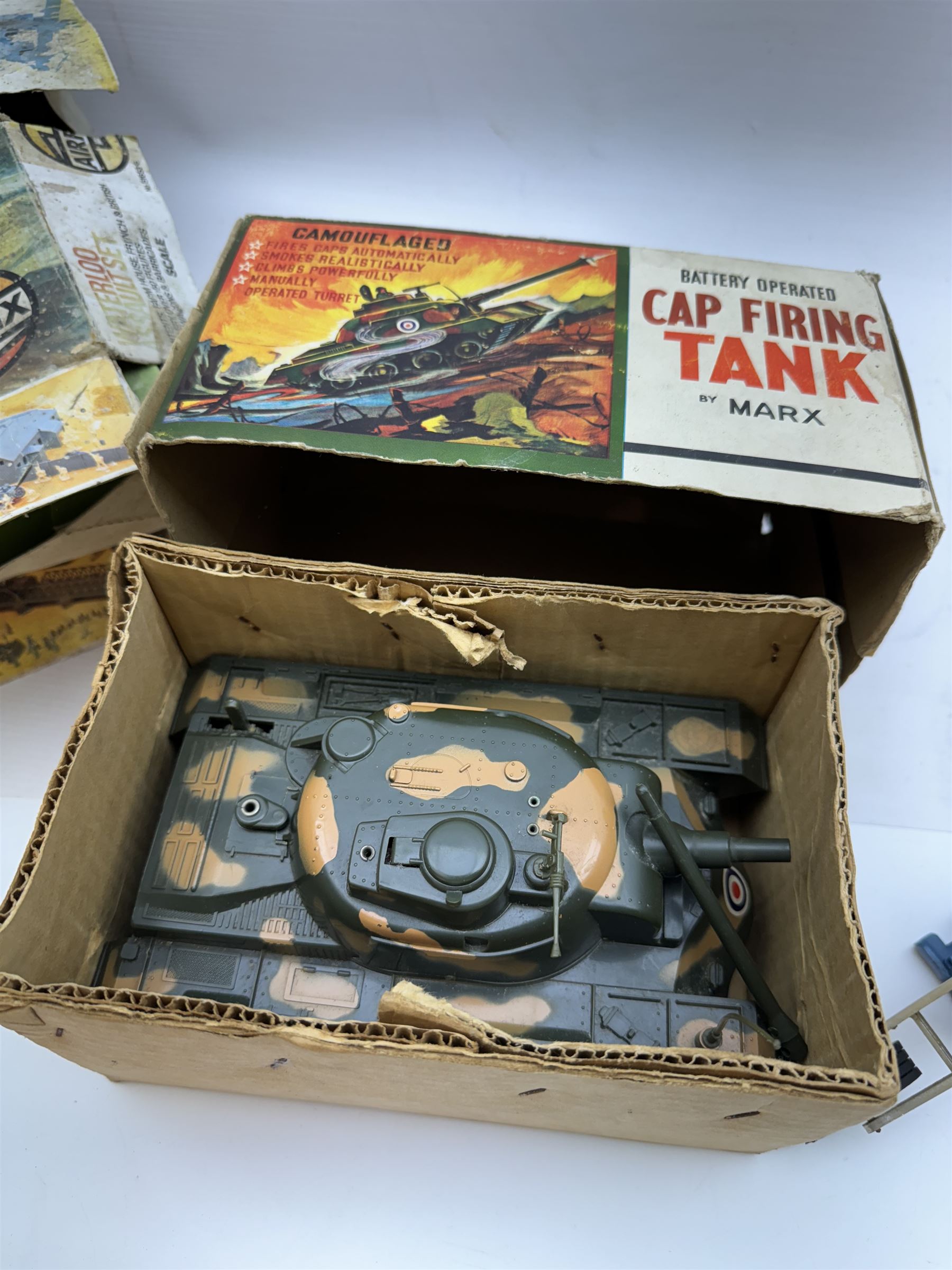 Two Airfix Assault Sets, to include Waterloo and Pontoon Bridge, both boxed, battery operated Cap Firing Tank by Marx, boxed, and a 1970s Hasbro motorcyclist 