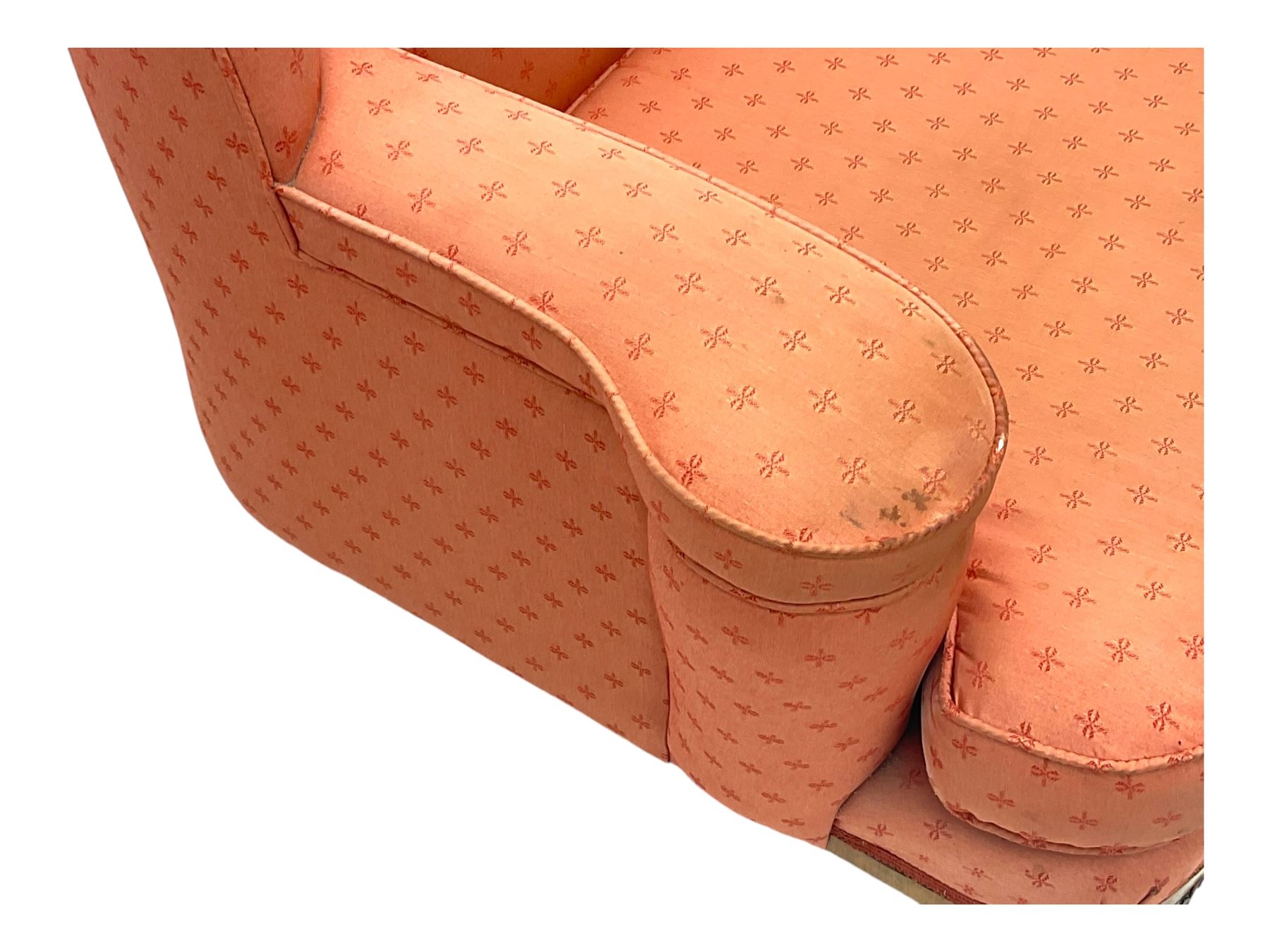 Late 20th century mahogany framed three seat sofa, upholstered in cream fabric with repeating cross pattern, raised on cabriole supports (W192cm, D98cm, H89cm); matching armchair in light pink fabric (W92cm, D98cm, H89cm) 