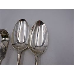 Two George III silver table spoons, including a bottom struck Hanoverian pattern example, hallmarked Thomas Dene, London 1766, and a pair of silver sugar tongs, hallmarked Newcastle 1842, maker's mark TW