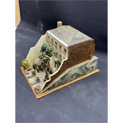 Mixed medium sculpture of house and garden, with makers mark beneath, H15cm