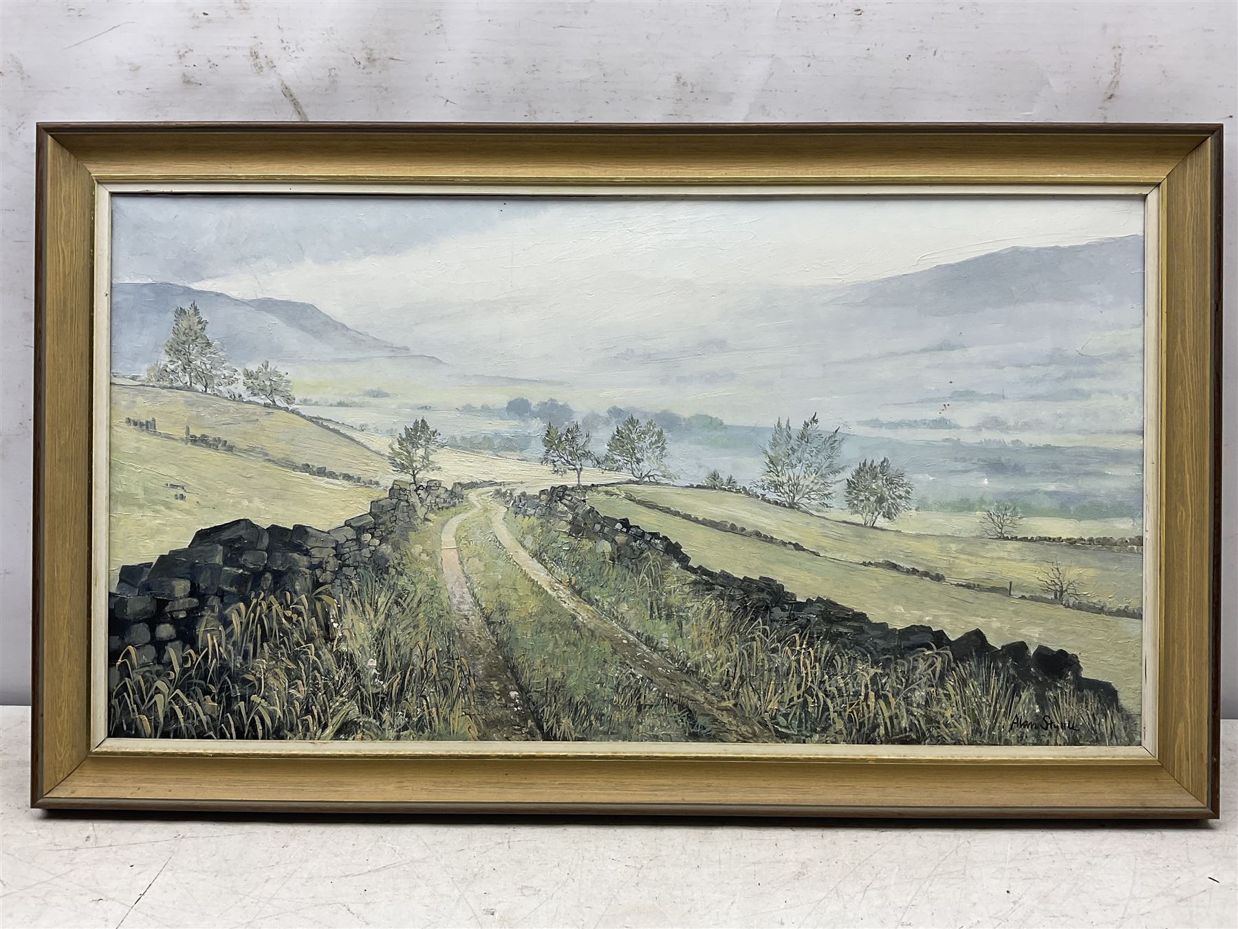 Alan Stuttle (Scarborough 1939-): 'Landscape - Yorkshire', oil on canvas signed, titled and dated 1976 verso 40cm x 75cm 