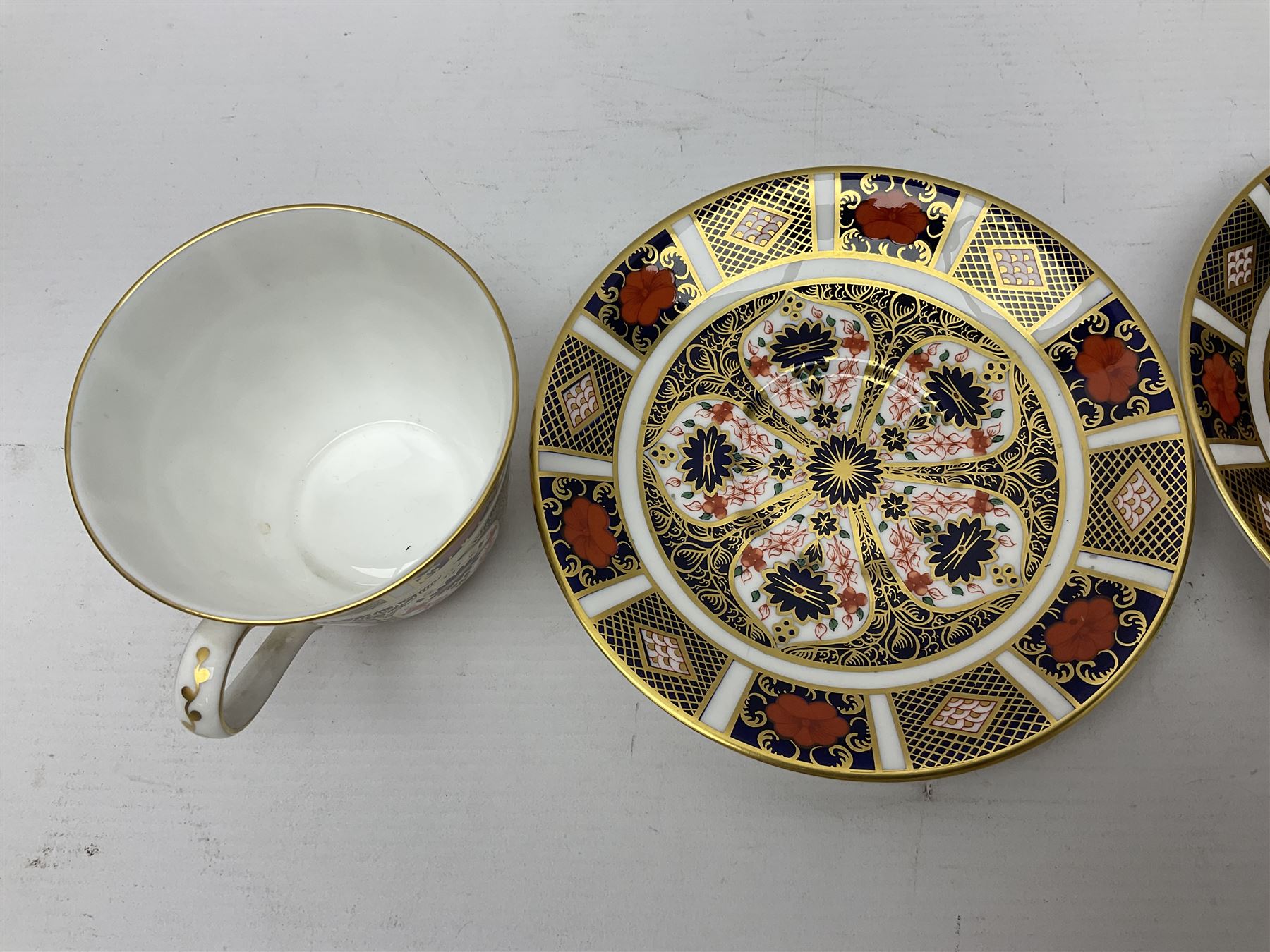 Royal Crown Derby 1128 Imari pattern two coffee cans and saucers, two teacups and saucers, all with printed mark beneath 